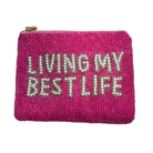 Pink beaded pouch with 'Living My Best Life' text on a white background