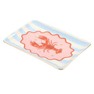Rectangular plate with a red lobster design on a striped background