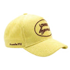 Yellow cap with brown text on a white background