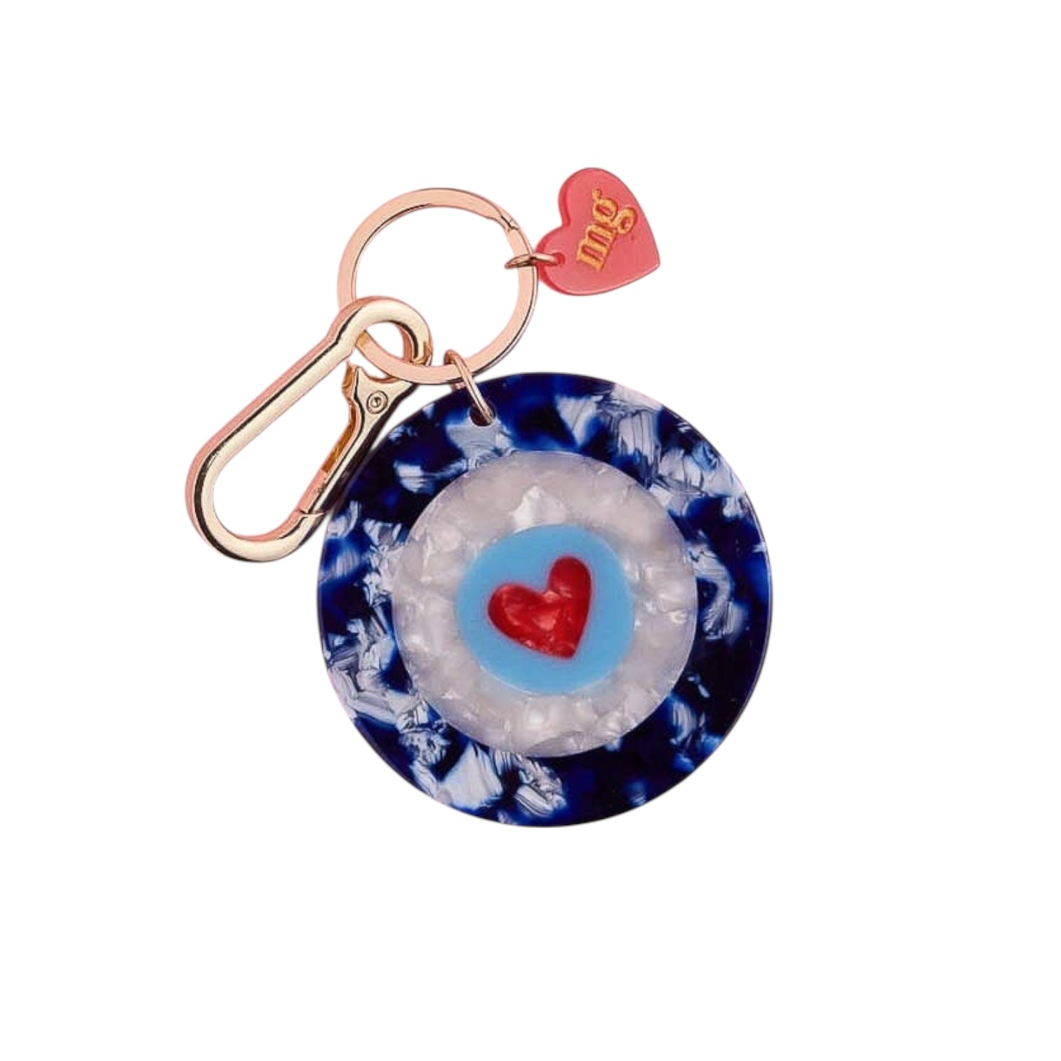 Keychain with blue and white pattern and red heart on a white background