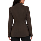 A woman shown from the back wearing a structured dark brown blazer with a peplum-like waist and black pants, against a plain white background.