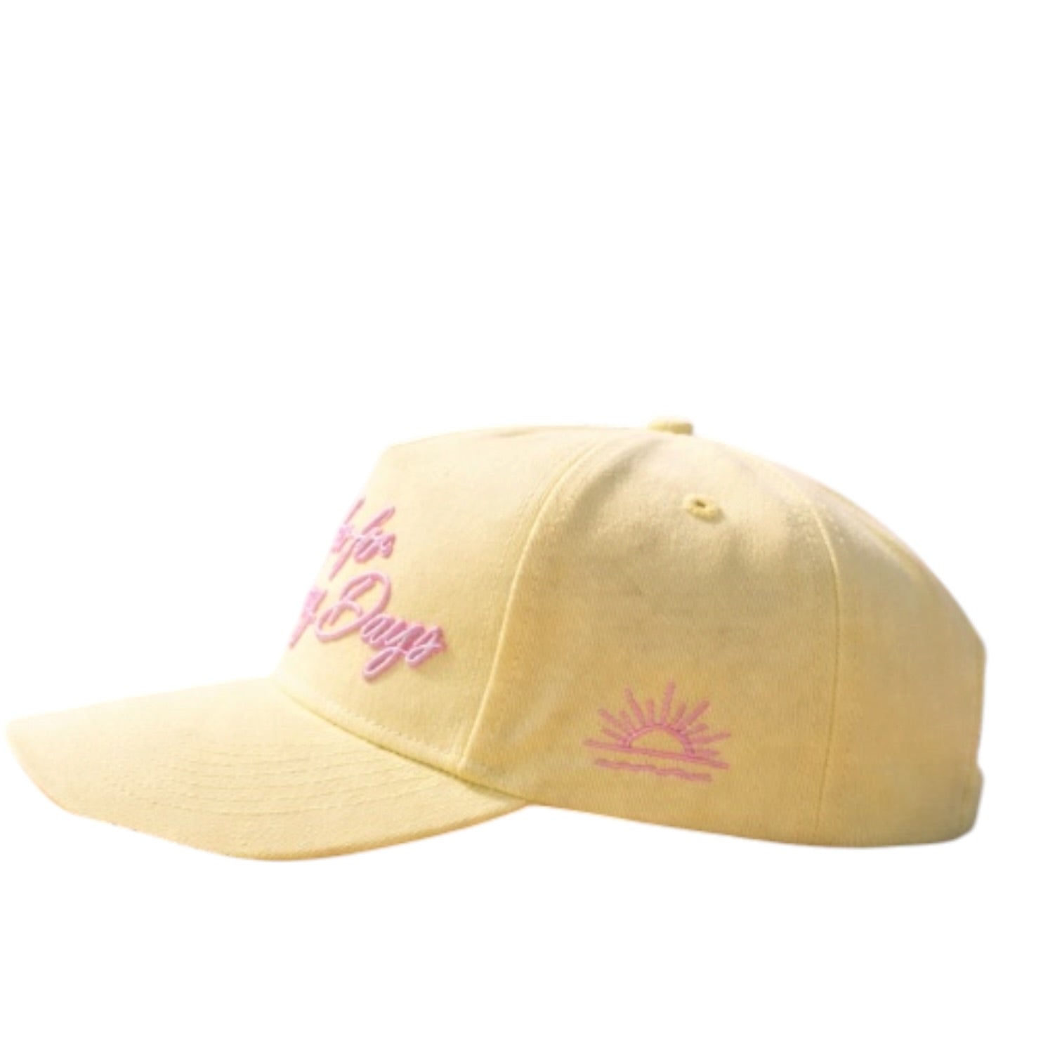 Yellow cap with pink text and design on a white background