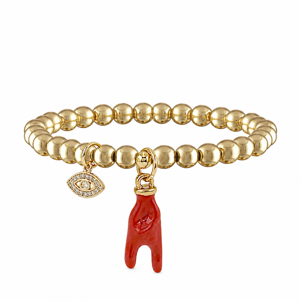 Gold beaded bracelet with a red charm and eye-shaped pendant on a white background