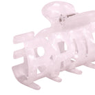 Pink hair clip on a white background