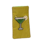 Embroidered cocktail glass design on a green fabric patch