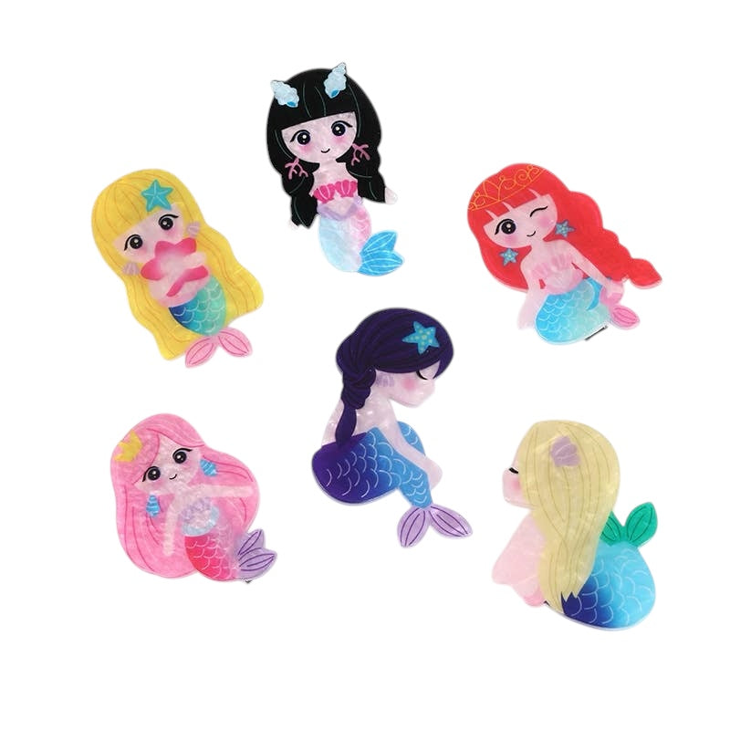 Set of colorful mermaid figurines with different hairstyles on a white background