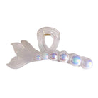 Mermaid tail clip with iridescent beads on a white background
