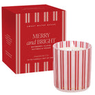 Red striped candle with 'Sweet Water Decor' packaging on a white background