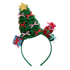 A festive Christmas tree headband featuring a green tulle tree with a gold glitter star on top, decorated with pink and red ribbon bows, and adorned with three wrapped presents in red, blue, and green on a white background.