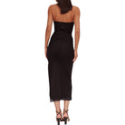Black strapless dress worn by a model on a white background