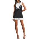 a woman wearing a layered slip dress with lace detail 