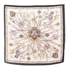 Decorative square scarf with intricate jewelry-themed design on a white background