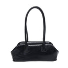 Black handbag with a handle on a white background