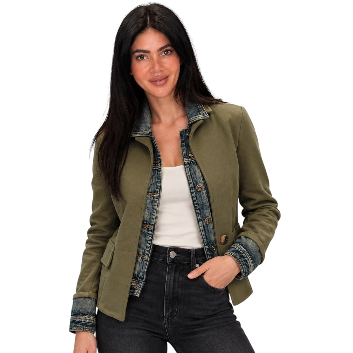 A woman modeling an olive green jacket with a denim collar, button front, and rolled-up cuffs, worn over a white top and dark jeans against a plain white background.