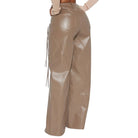 Beige leather pants on a white background