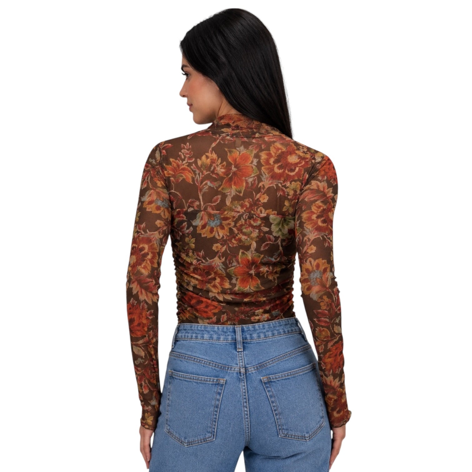 A woman shown from the back wearing a brown long-sleeve ruched bodysuit with a rust-orange floral pattern and blue jeans, against a plain white background.