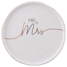 Round ceramic plate with 'MR & MRS' text on a white background