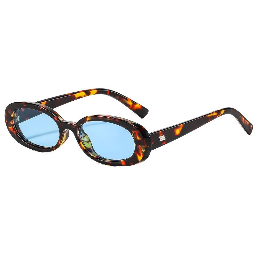 Sunglasses with tortoiseshell frame and blue lenses on a white background