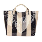 Tote bag with black and beige striped pattern on a white background