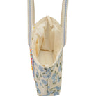 Floral-patterned bag with a white interior on a white background