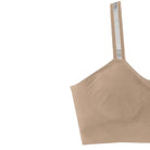 Beige bra on a white background