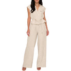 Woman wearing a beige set on a white background
