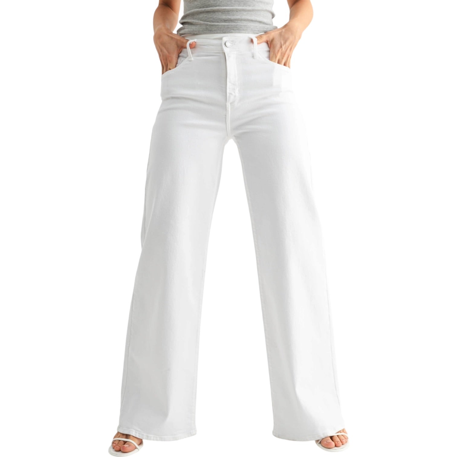 White jeans worn by a person on a white background