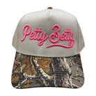 real tree brim trucker hat with "Petty Betty" embroidered in pink