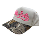 real tree brim trucker hat with "Petty Betty" embroidered in pink
