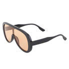 Black sunglasses with brown lenses on a white background