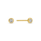 Gold stud earrings with clear gemstones on a white background