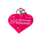 Pink heart-shaped keychain with 'Passenger Princess' text on a white background