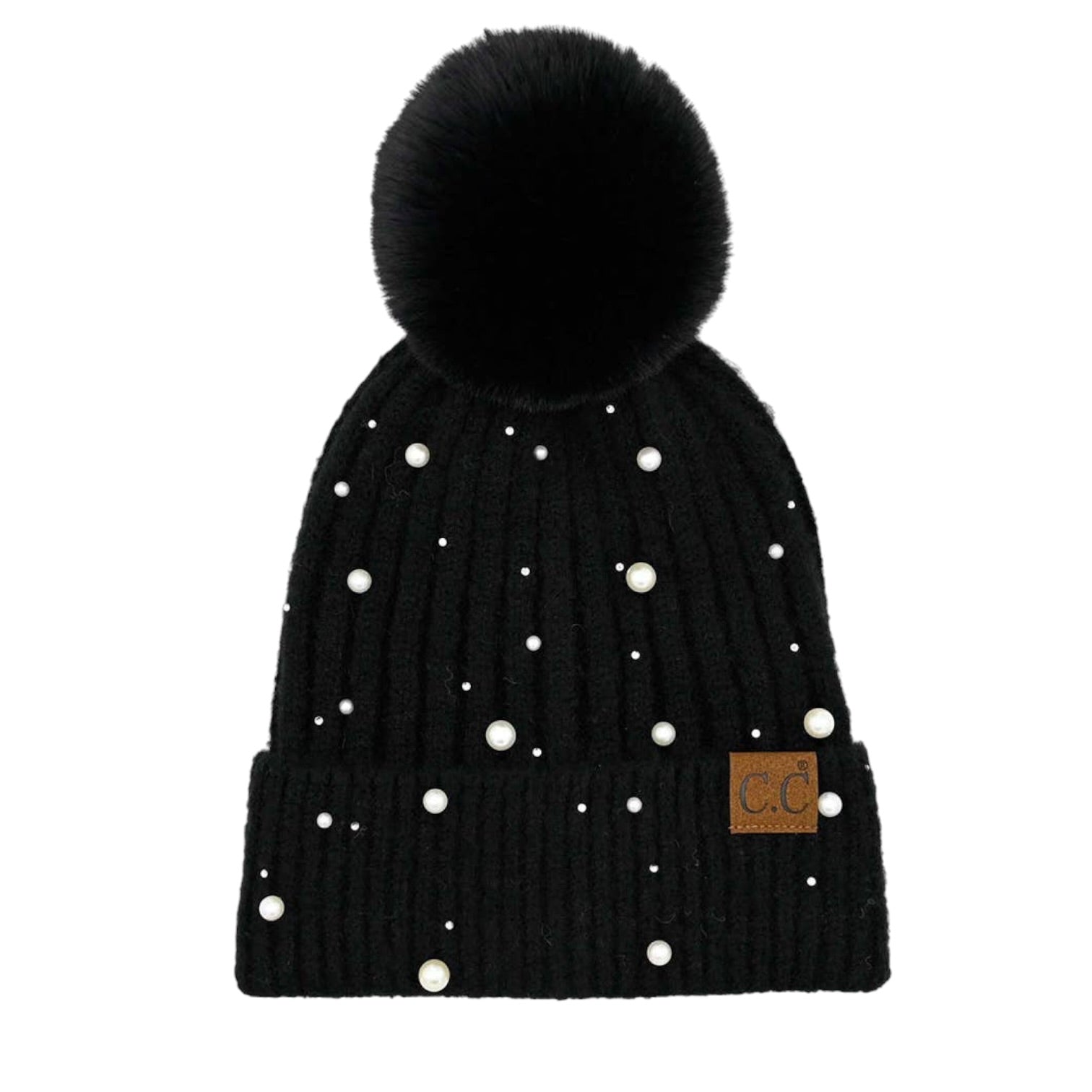 A black ribbed knit pom-pom beanie decorated with scattered white faux pearls and featuring a small brown leather 'CG' brand patch on the cuff, shown against a plain white background.