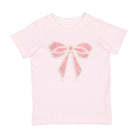 Pink t-shirt with a decorative bow design on a white background