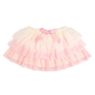 Pink tutu skirt with a bow on a white background