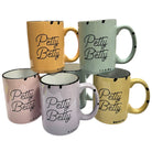 Set of five mugs with 'Petty Betty' text in various colors on a white background