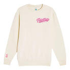 An off-white crewneck sweatshirt featuring a pink 'Petty Betty' script logo on the left chest and a small pink crown logo on the right sleeve, displayed against a solid white background.