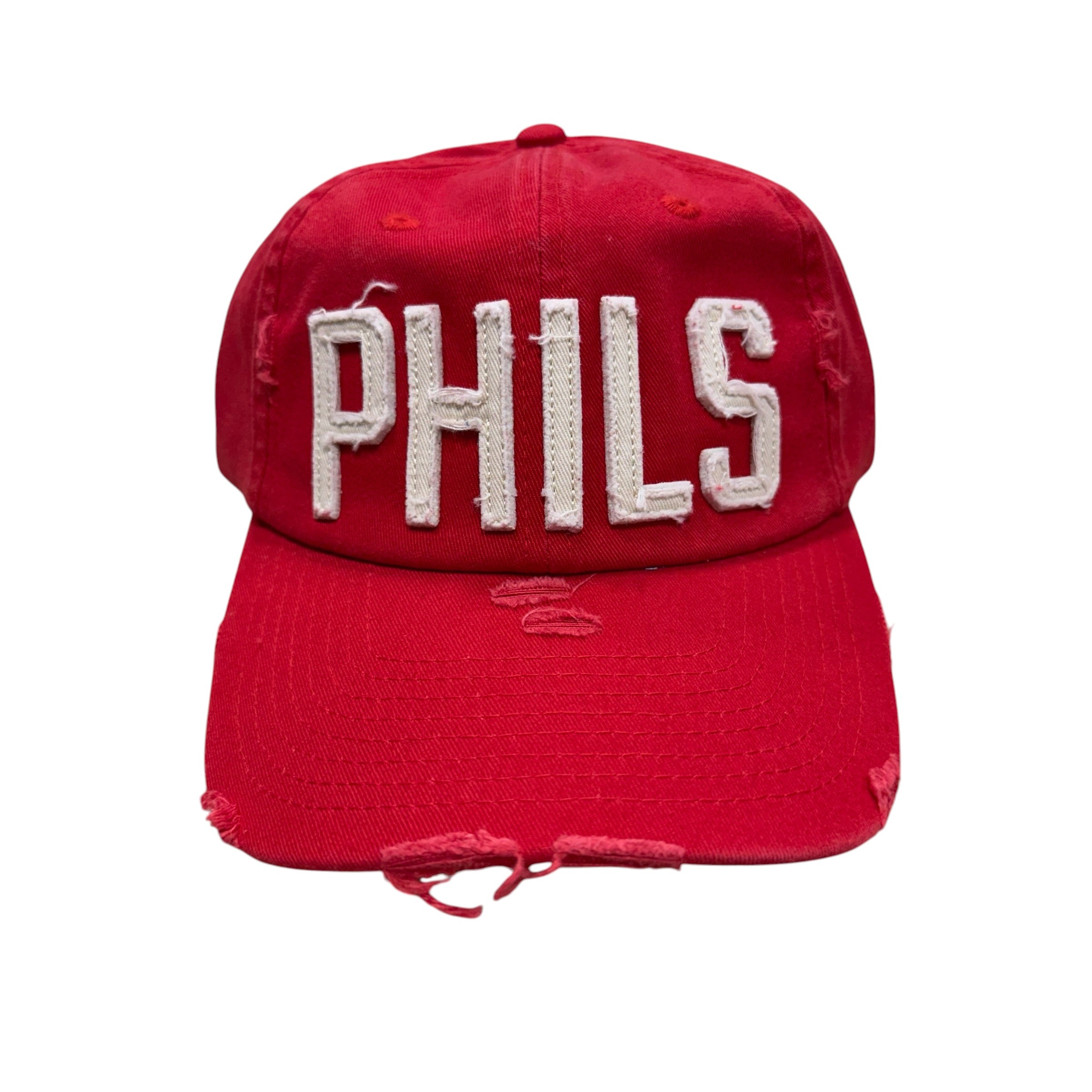 Red cap with 'PHILS' text on a white background
