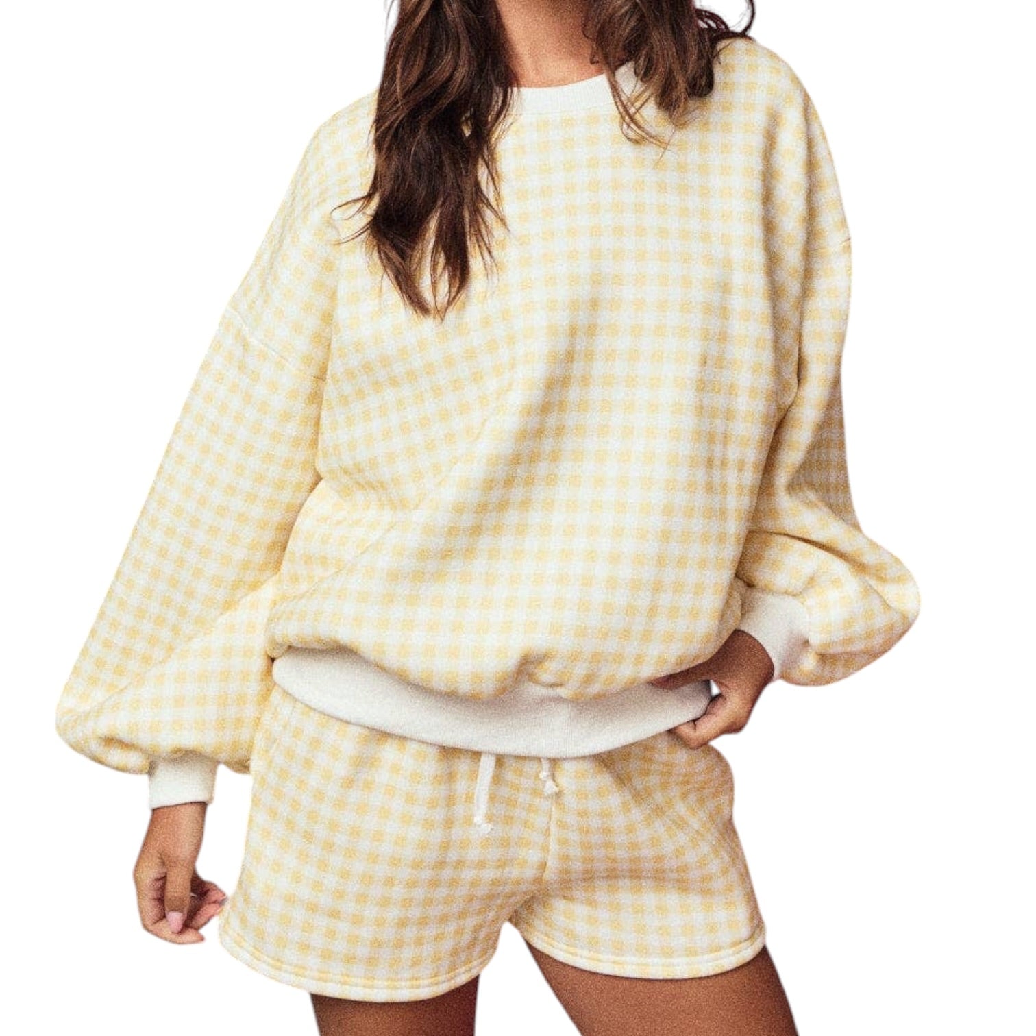 Person wearing a yellow and white checkered outfit on a white background