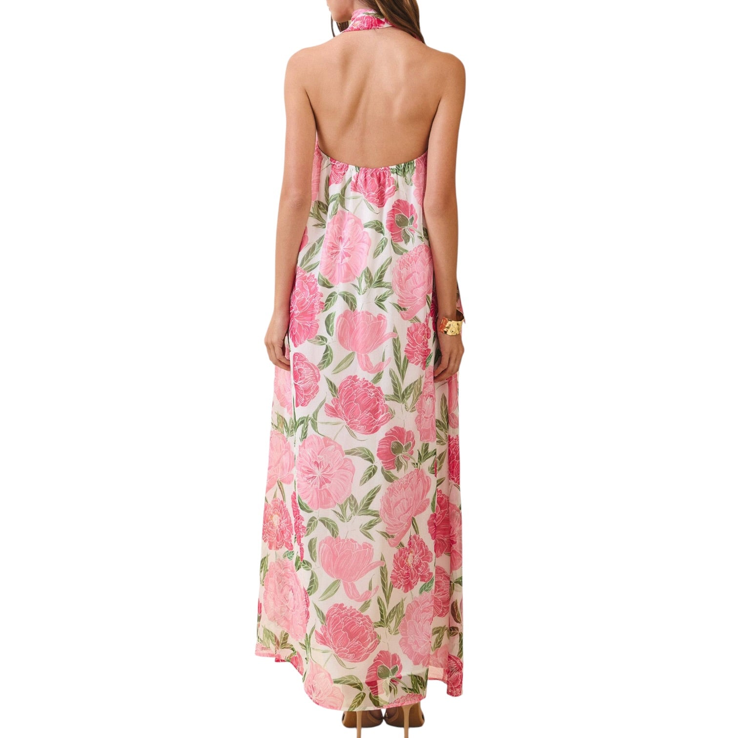 Woman wearing a pink floral dress on a white background