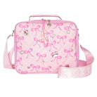 A pink quilted lunch bag decorated with pink bow patterns, rhinestones, and faux pearls, featuring a top handle and a detachable shoulder strap on a white background.