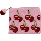 Pink beaded pouch with cherry design and pom-pom on a white background