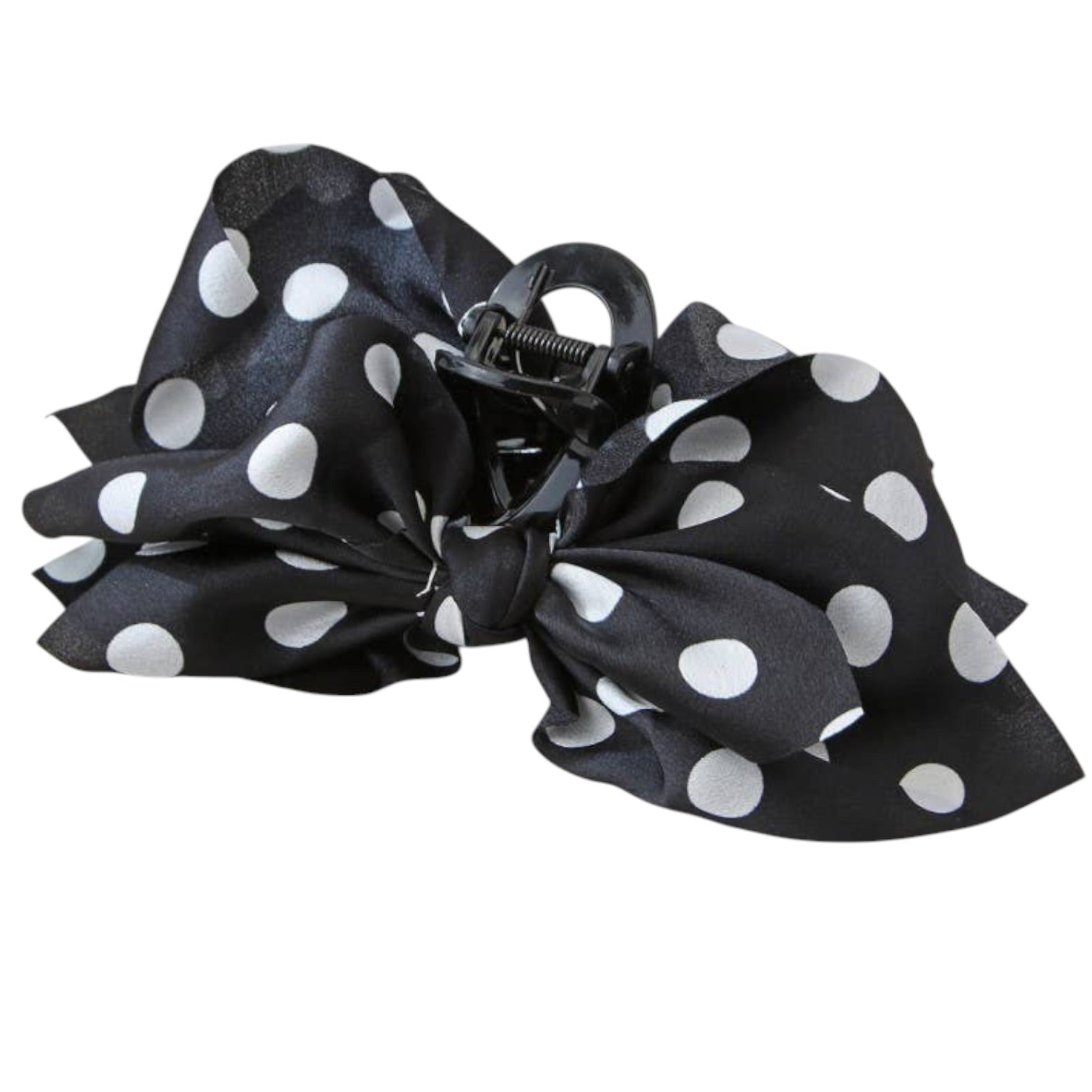 A black hair claw clip decorated with a large, layered ruffle bow made of black fabric with white polka dots, shown on a plain white background.