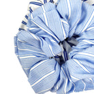 Close-up of blue and white striped fabric on a white background