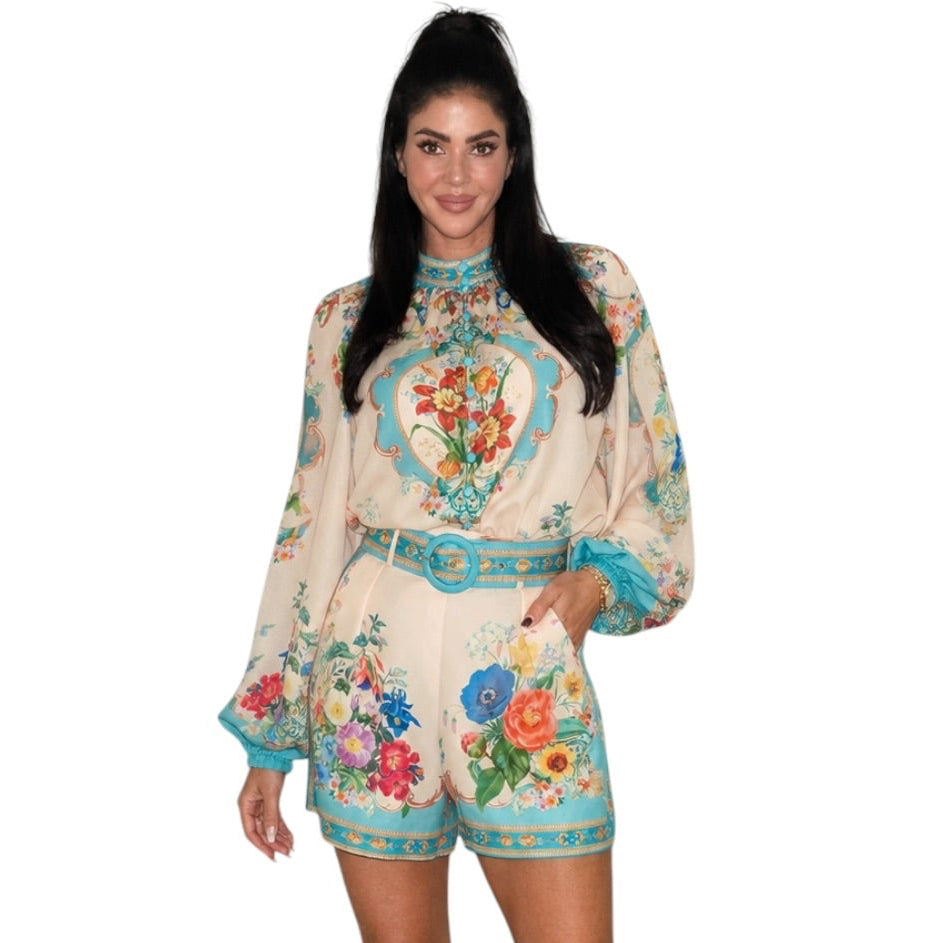 woman wearing a patterned short set on white background