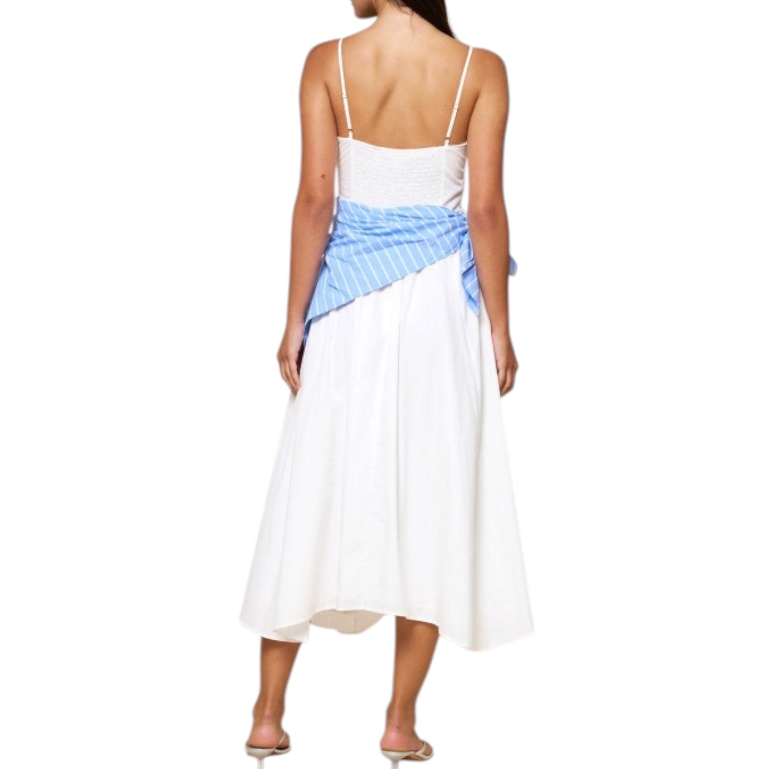 White dress with blue accents on a white background