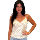 tan satin camisole with lace trim on a white background