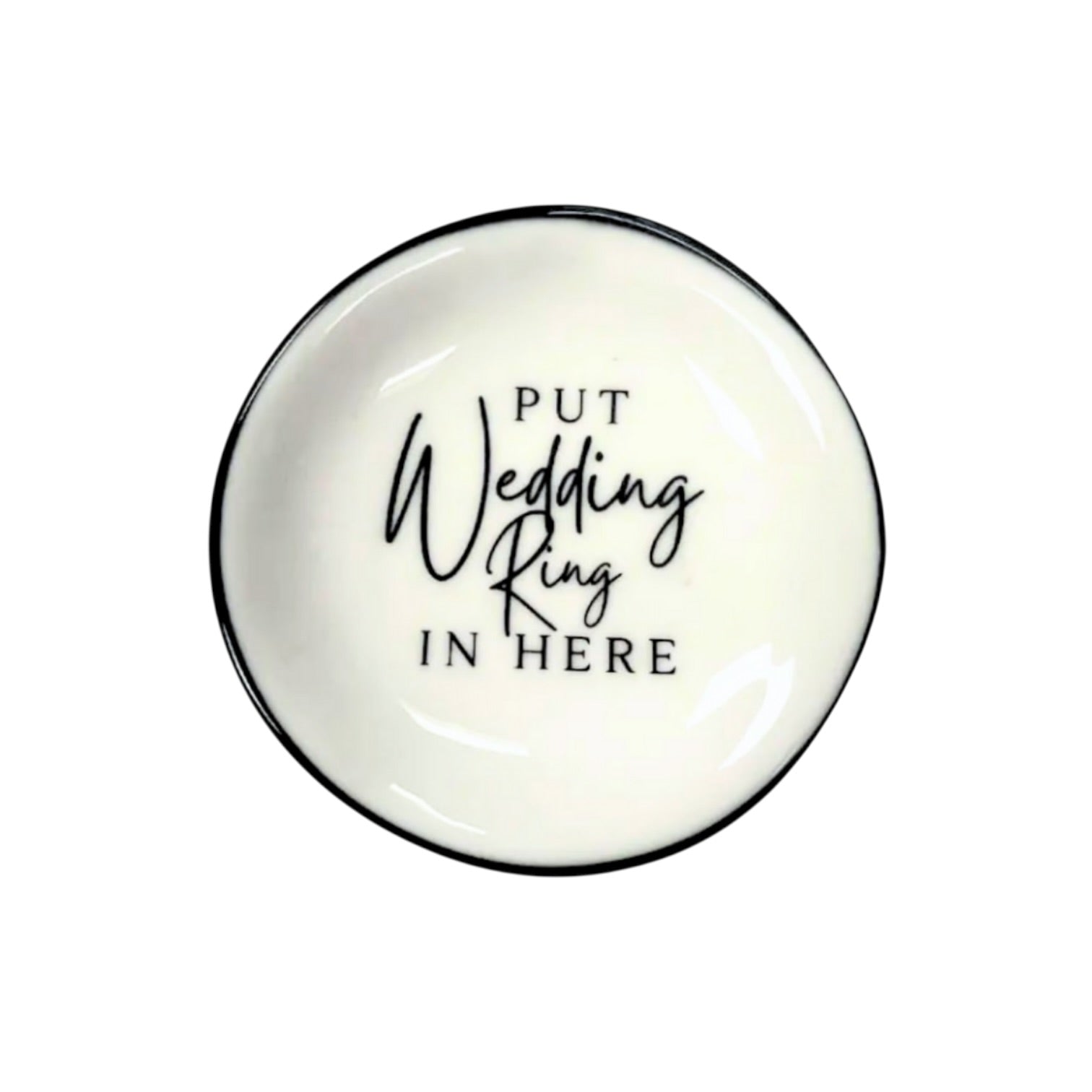 Round white dish with black text 'Put Wedding Ring In Here' on a white background