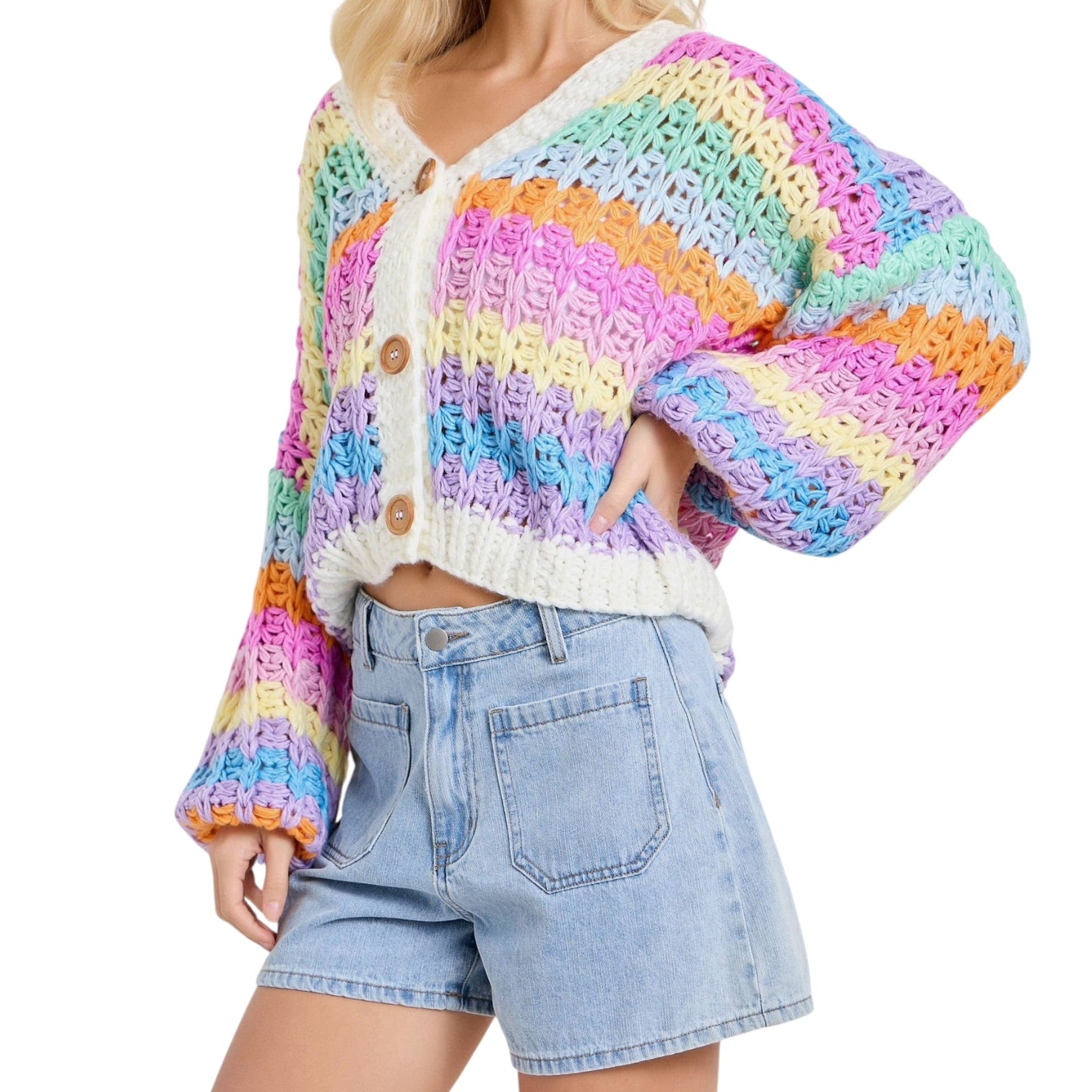 Multicolored crochet cardigan worn by a person on a white background