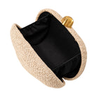khaki twisted straw clutch bag on white background